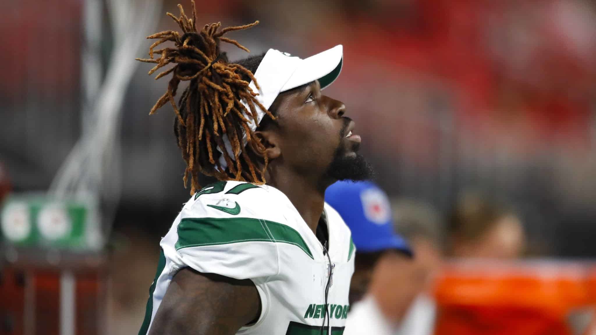 ATLANTA, GA - AUGUST 15: C.J. Mosley #57 of the New York Jets looks on from the bench during the second half of an NFL preseason game against the Atlanta Falcons at Mercedes-Benz Stadium on August 15, 2019 in Atlanta, Georgia.