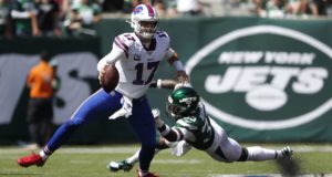 EAST RUTHERFORD, NEW JERSEY - SEPTEMBER 08: Josh Allen #17 of the Buffalo Bills shakes Jamal Adams #33 of the New York Jets during the first quarter at MetLife Stadium on September 08, 2019 in East Rutherford, New Jersey.