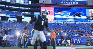FOXBORO, MA - AUGUST 22: Cam Newton #1 of the Carolina Panthers runs onto the field before a preseason game with the New England Patriots at Gillette Stadium on August 22, 2014 in Foxboro, Massachusetts.