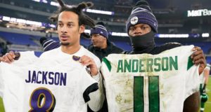BALTIMORE, MARYLAND - DECEMBER 12: Quarterback Lamar Jackson #8 of the Baltimore Ravens and wide receiver Robby Anderson #11 of the New York Jets exchange jerseys after the game at M&T Bank Stadium on December 12, 2019 in Baltimore, Maryland.The Baltimore Ravens win 42-21 over the New York Jets