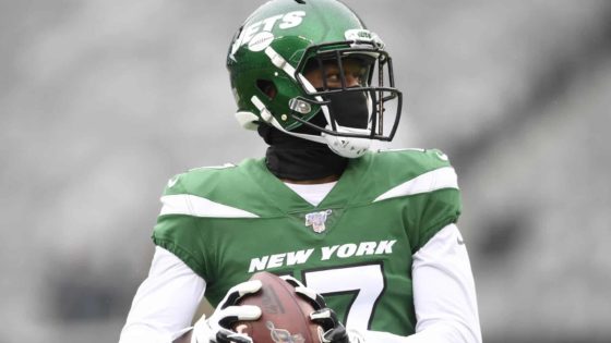 New York Jets defensive lineman Nathan Shepherd (97) wearing a face mask  head off the field after an NFL football game against the Los Angeles  Chargers, Sunday, November 22, 2020 in Inglewood