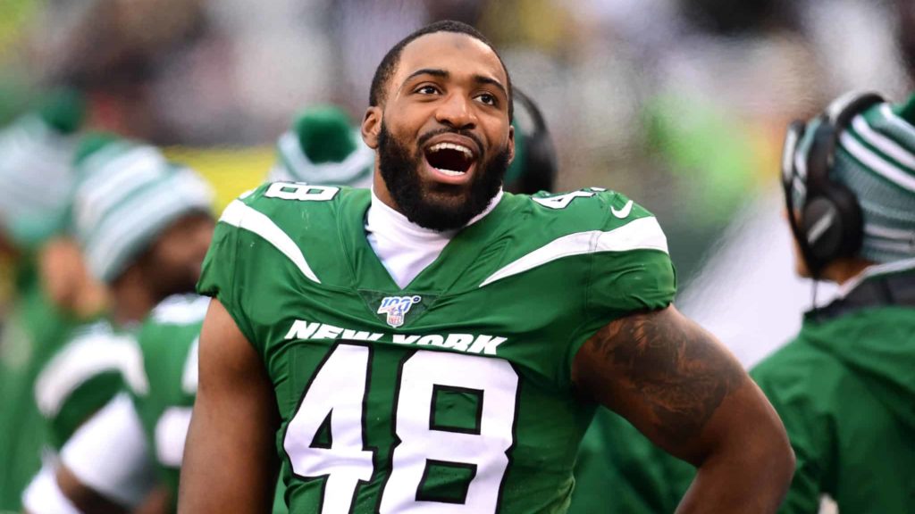 EAST RUTHERFORD, NEW JERSEY - NOVEMBER 24: Jordan Jenkins #48 of the New York Jets reacts from the sidelines during the second half of their game against the Oakland Raiders at MetLife Stadium on November 24, 2019 in East Rutherford, New Jersey.