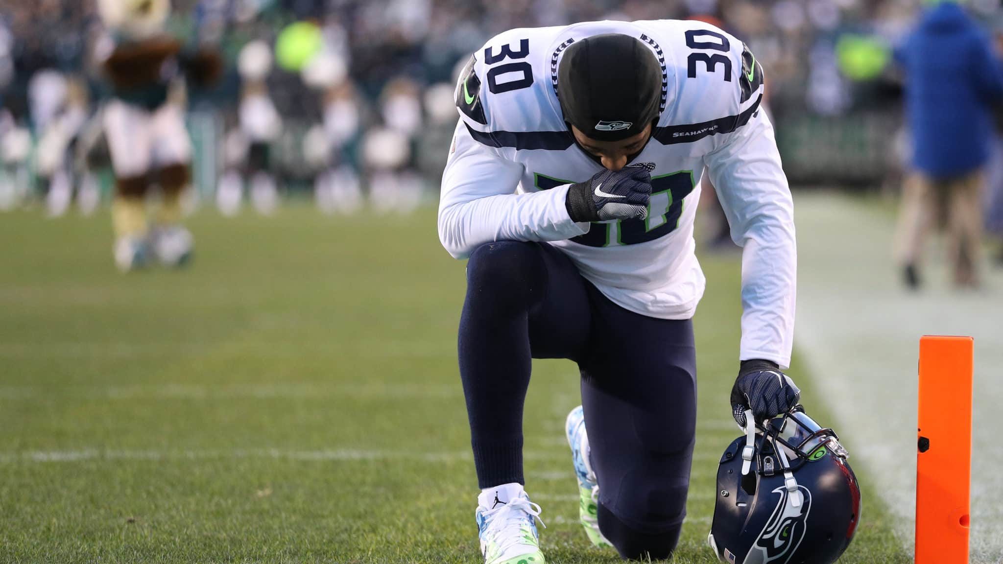 PHILADELPHIA, PENNSYLVANIA - JANUARY 05: Strong safety Bradley McDougald #30 of the Seattle Seahawks has a moment to himself before playing against the Philadelphia Eagles during their NFC Wild Card Playoff game at Lincoln Financial Field on January 05, 2020 in Philadelphia, Pennsylvania.