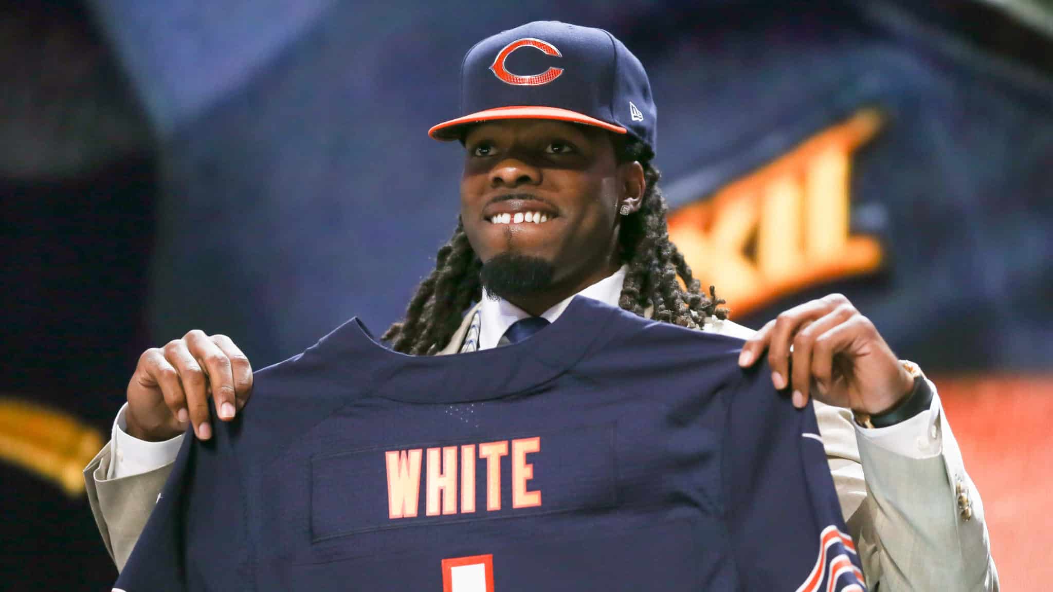 CHICAGO, IL - APRIL 30: Kevin White of the West Virginia Mountaineers holds up a jersey after being chosen #7 overall by the Chicago Bears during the first round of the 2015 NFL Draft at the Auditorium Theatre of Roosevelt University on April 30, 2015 in Chicago, Illinois.