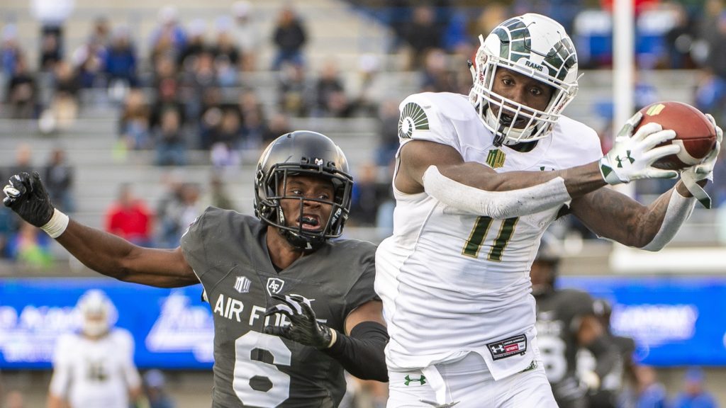 COLORADO SPRINGS, CO - NOVEMBER 22:Preston Williams #11 of the Colorado State Rams makes a reception past Zane Lewis #6 of the Air Force Falcons during the first half at Falcon Stadium on November 22, 2018 in Colorado Springs, Colorado.