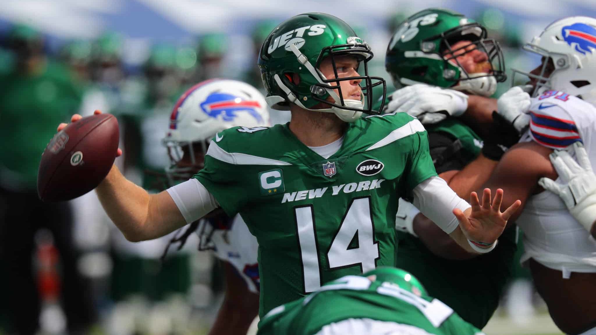 ORCHARD PARK, NY - SEPTEMBER 13: Sam Darnold #14 of the New York Jets throws a pass during the first quarter against the Buffalo Bills at Bills Stadium on September 13, 2020 in Orchard Park, New York.