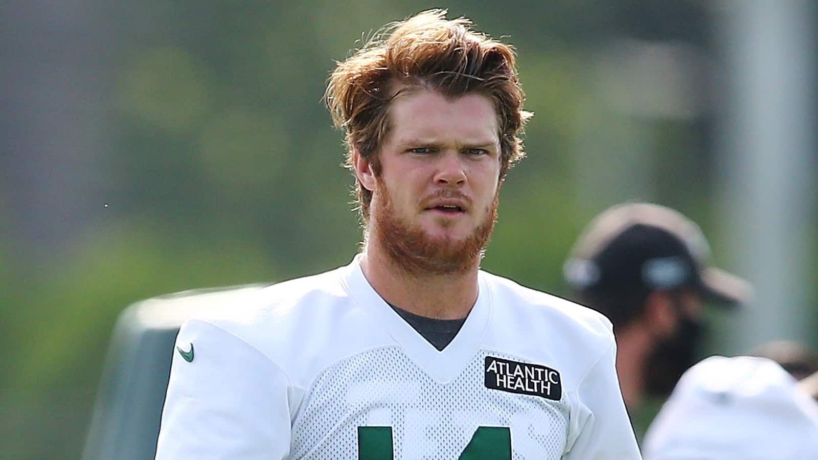 FLORHAM PARK, NEW JERSEY - AUGUST 14: Sam Darnold #14 of the New York Jets runs drills at Atlantic Health Jets Training Center on August 14, 2020 in Florham Park, New Jersey.