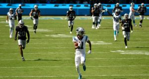 CHARLOTTE, NORTH CAROLINA - SEPTEMBER 13: Robby Anderson #11 of the Carolina Panthers breaks free for a touchdown against the Las Vegas Raiders at Bank of America Stadium on September 13, 2020 in Charlotte, North Carolina. Las Vegas won 34-30.