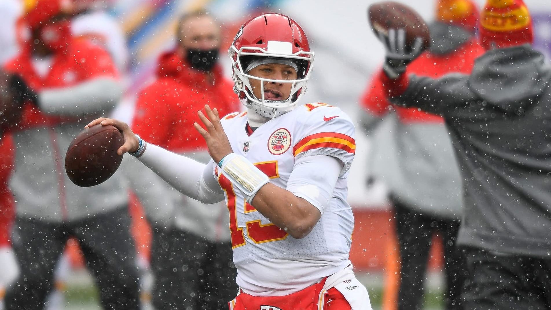 DENVER, CO - OCTOBER 25: Patrick Mahomes #15 of the Kansas City Chiefs throws to warm up before a game against the Denver Broncos at Empower Field at Mile High on October 25, 2020 in Denver, Colorado.