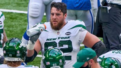 INDIANAPOLIS, IN - SEPTEMBER 27: New York Jets offensive guard Greg Van Roten (62) looks on in action during a NFL game between the Indianapolis Colts and the New York Jets on September 27, 2020 at Lucas Oil Stadium in Indianapolis, IN.