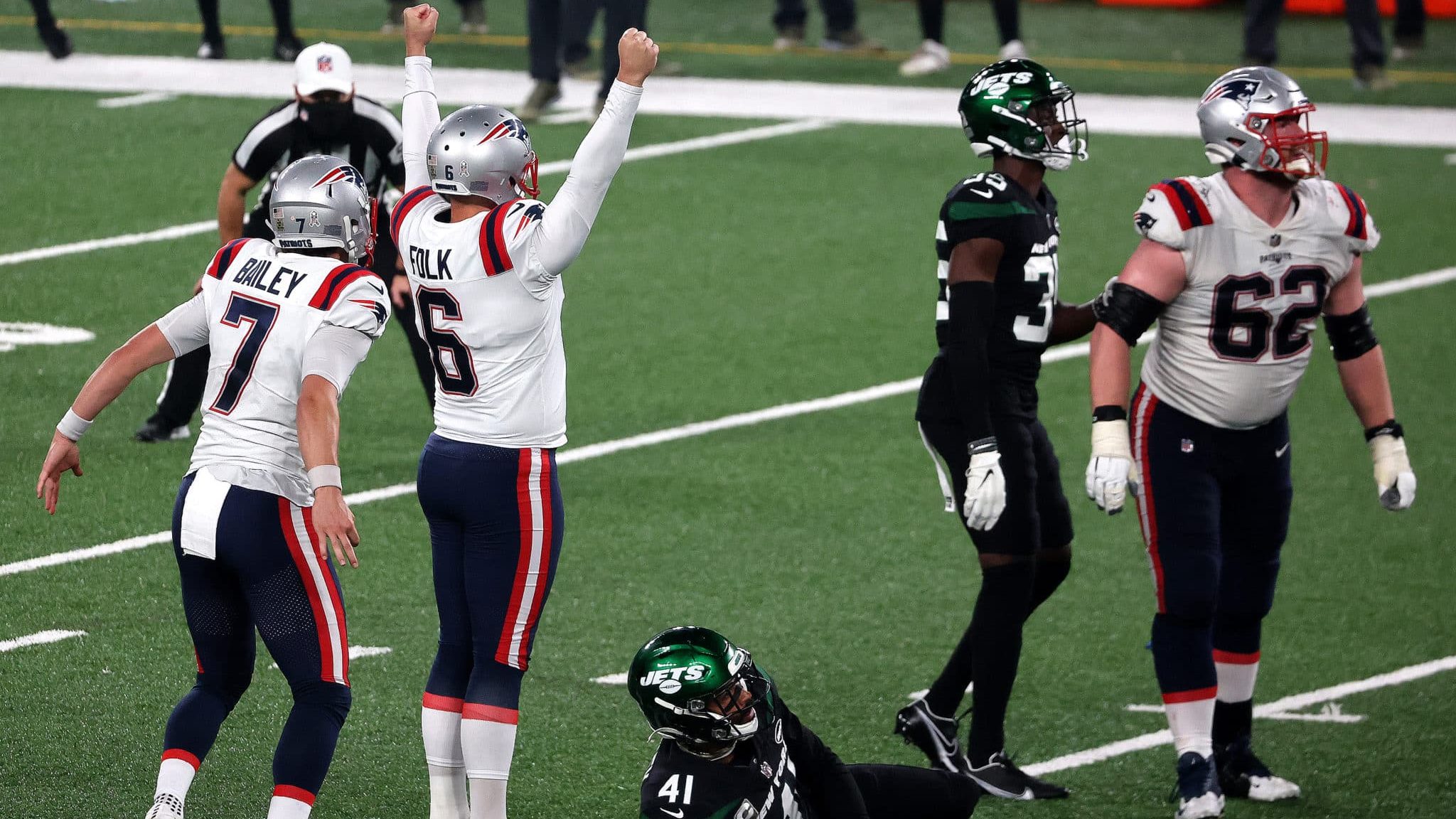 EAST RUTHERFORD, NJ - NOVEMBER 9: New England Patriots kicker Nick Folk (6) turned towards his old team and raises his arms in triumph after kicking the game winning field goal to beat the New York Jets 30-27 with seconds left in the fourth quarter. The New York Jets host the New England Patriots in a Monday Night Football game at MetLife stadium in East Rutherford, NJ on Nov. 9, 2020.