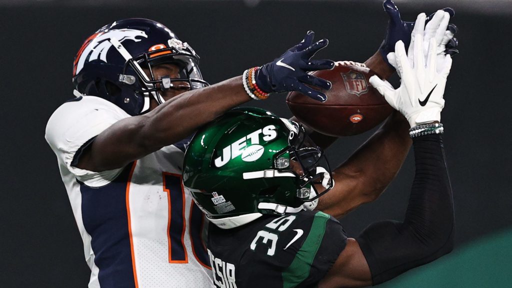 EAST RUTHERFORD, NEW JERSEY - OCTOBER 01: Jerry Jeudy #10 of the Denver Broncos catches a pass for a touchdown against Pierre Desir #35 of the New York Jets during the second quarter at MetLife Stadium on October 01, 2020 in East Rutherford, New Jersey.