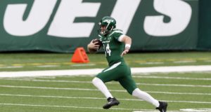 EAST RUTHERFORD, NEW JERSEY - OCTOBER 25: (NEW YORK DAILIES OUT) Sam Darnold #14 of the New York Jets in action against the Buffalo Bills at MetLife Stadium on October 25, 2020 in East Rutherford, New Jersey. The Bills defeated the Jets 18-10.