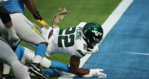 INGLEWOOD, CALIFORNIA - NOVEMBER 22: La'Mical Perine #22 of the New York Jets stretches into the end zone for a touchdown during the first half against the Los Angeles Chargers at SoFi Stadium on November 22, 2020 in Inglewood, California.