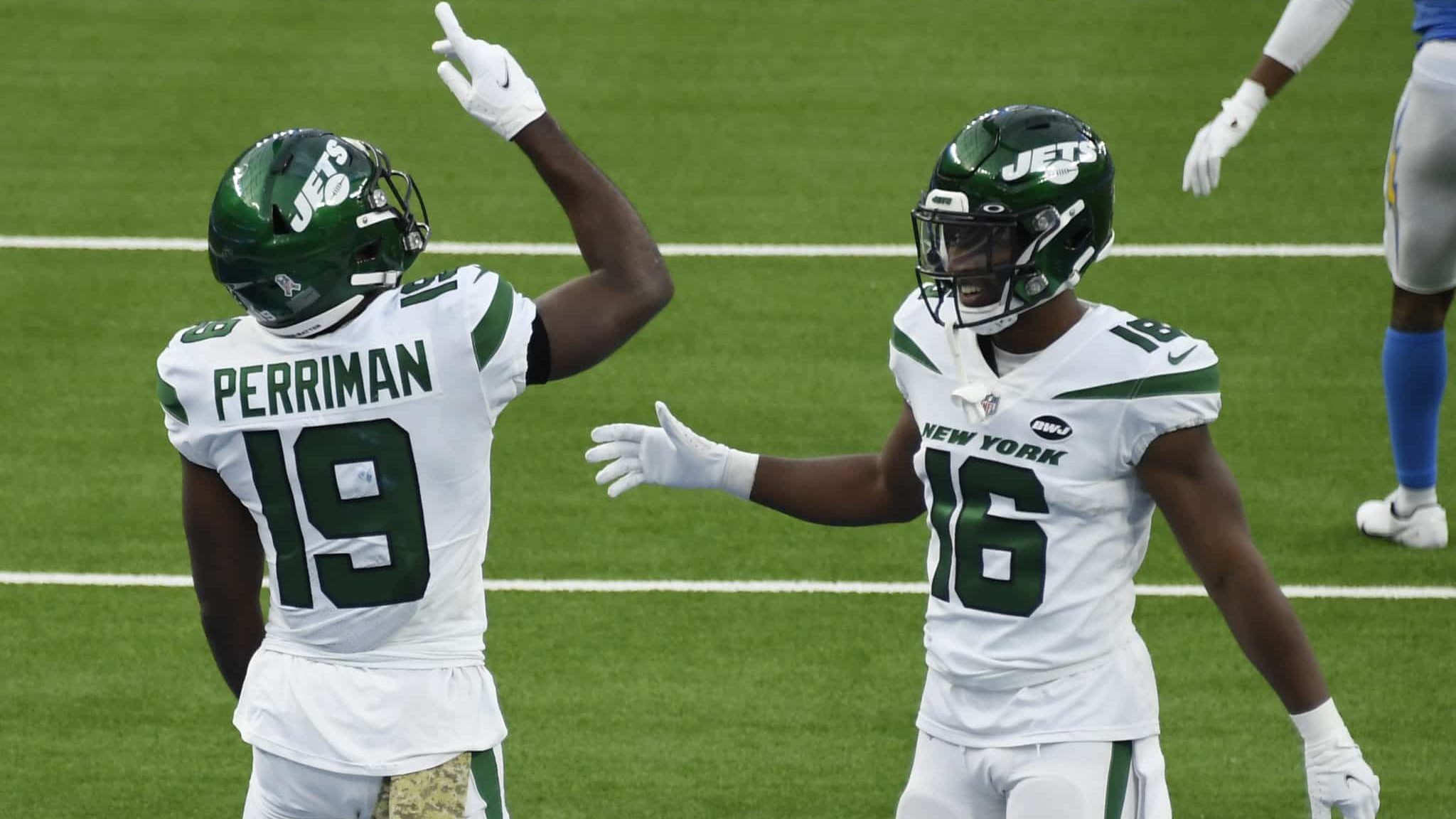 INGLEWOOD, CALIFORNIA - NOVEMBER 22: Jeff Smith #16 of the New York Jets celebrates with Breshad Perriman #19 after Perriman's touchdown during the second half against the Los Angeles Chargers at SoFi Stadium on November 22, 2020 in Inglewood, California.