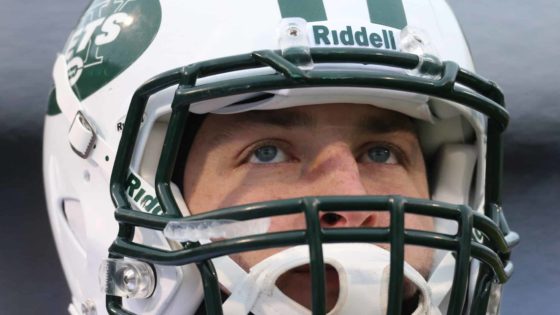 Closeup of New York Jets John Riggins on sidelines during game vs