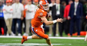 NEW ORLEANS, LOUISIANA - JANUARY 13: Trevor Lawrence #16 of the Clemson Tigers runs with the ball during the first quarter of the College Football Playoff National Championship game against the LSU Tigers at the Mercedes Benz Superdome on January 13, 2020 in New Orleans, Louisiana. The LSU Tigers topped the Clemson Tigers, 42-25.