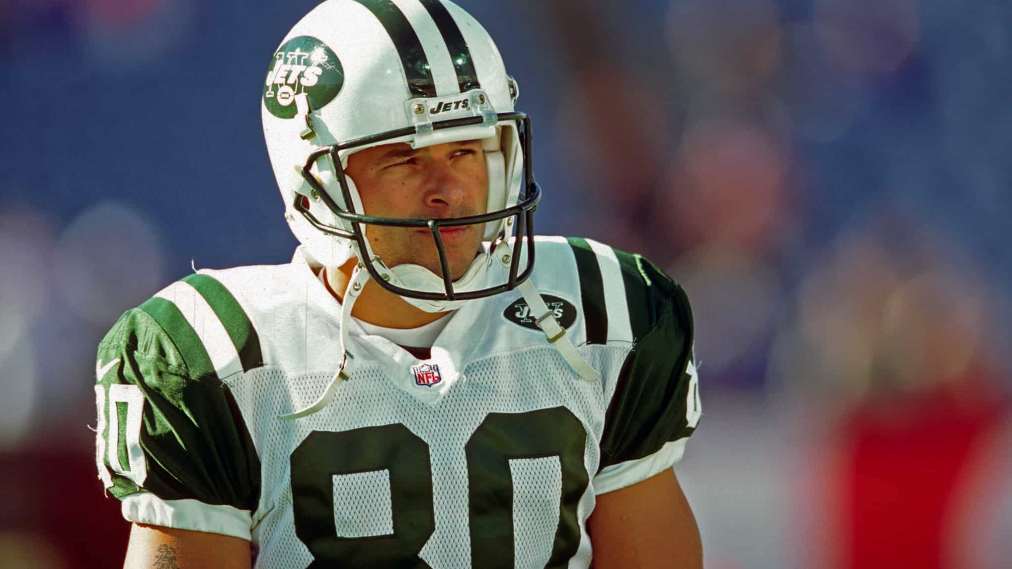 ORCHARD PARK, NY - OCTOBER 29: Wide receiver Wayne Chrebet #80 of the New York Jets looks on from the field before a game against the Buffalo Bills at Ralph Wilson Stadium on October 29, 2000 in Orchard Park, New York. The Bills defeated the Jets 23-20.