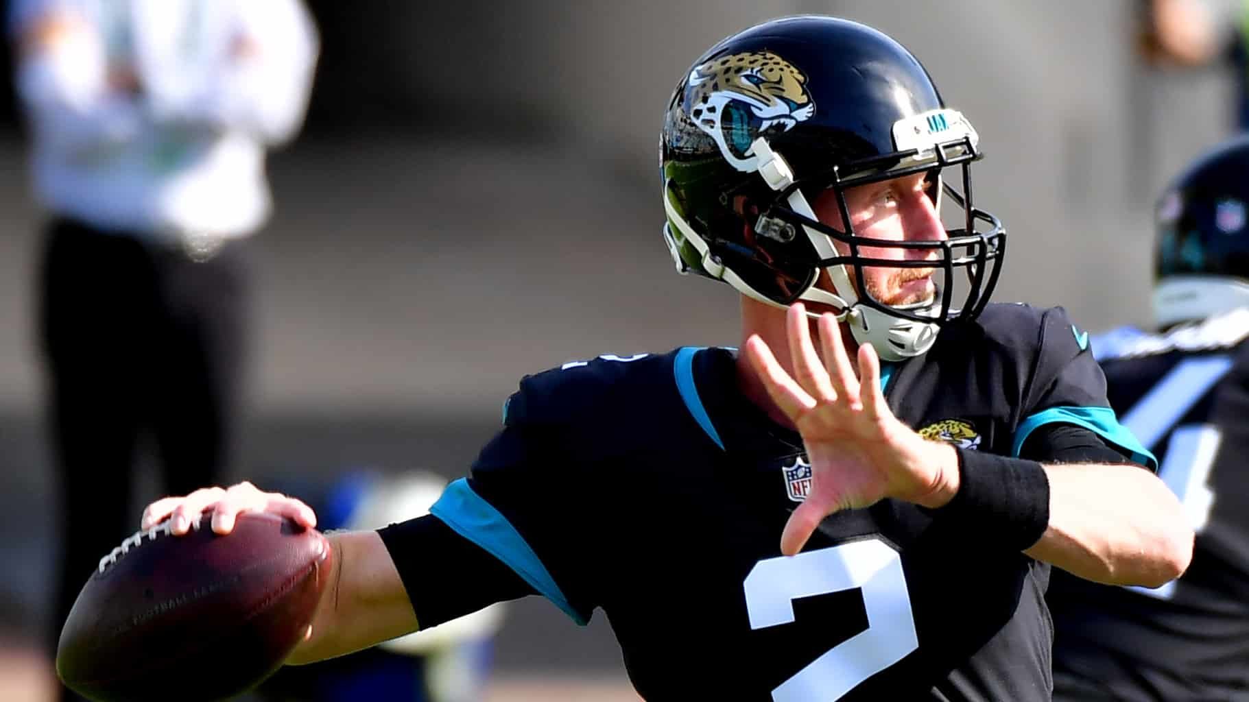 JACKSONVILLE, FLORIDA - DECEMBER 13: Mike Glennon #2 of the Jacksonville Jaguars makes a pass against the Tennessee Titans at TIAA Bank Field on December 13, 2020 in Jacksonville, Florida.