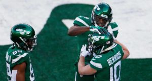 EAST RUTHERFORD, NEW JERSEY - DECEMBER 27: Braxton Berrios #10 of the New York Jets celebrates his touchdown with Breshad Perriman #19 and Trevon Wesco #85 in the first quarter against the Cleveland Browns at MetLife Stadium on December 27, 2020 in East Rutherford, New Jersey.