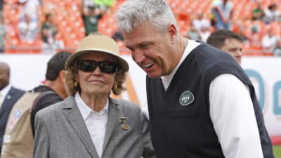 MIAMI GARDENS, FL - DECEMBER 29: Head coach Rex Ryan of the New York Jets talks to Betty Wold Johnson, mother of New York Jets owner Woody Johnson prior to the game against the Miami Dolphins on December 29, 2013 at Sun Life Stadium in Miami Gardens, Florida. The Jets defeated the Dolphins 20-7.
