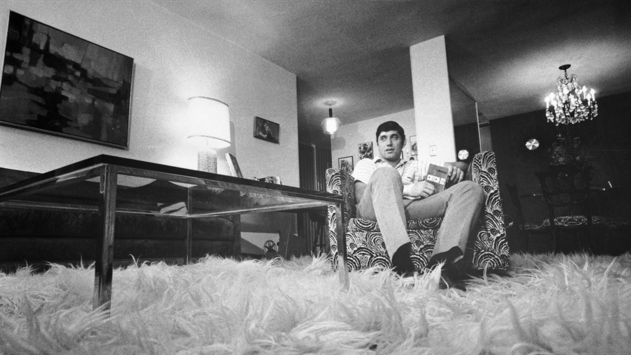 Joe Namath is shown as he relaxes in his bachelor "pad" on New York's swank East Side in this file photo. The rug is white llama.