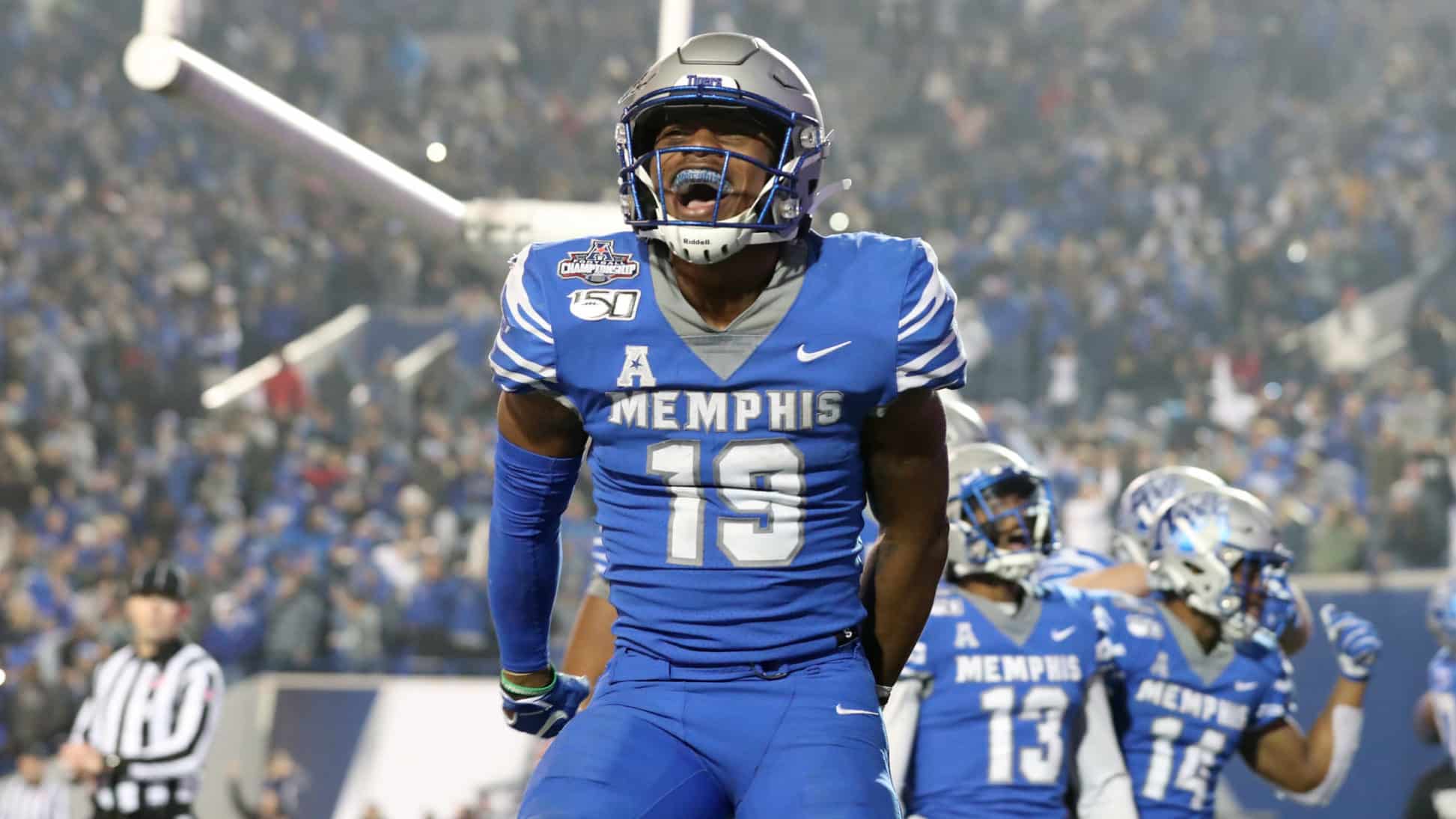 MEMPHIS, TN - DECEMBER 7: Kenneth Gainwell #19 of the Memphis Tigers celebrates a touchdown against the Cincinnati Bearcats during the American Athletic Conference Championship game on December 7, 2019 at Liberty Bowl Memorial Stadium in Memphis, Tennessee. Memphis defeated Cincinnati 29-24.