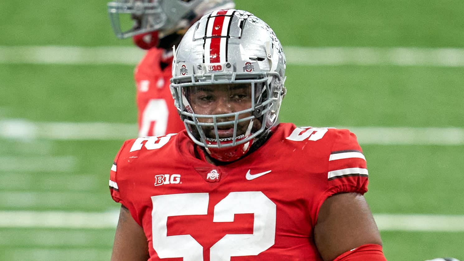 INDIANAPOLIS, IN - DECEMBER 19: Ohio State Buckeyes offensive lineman Wyatt Davis (52) looks on in action during the Big Ten Championship game between the Ohio State Buckeyes and the Northwestern Wildcats on December 19, 2020 at Lucas Oil stadium, in Indianapolis, IN.