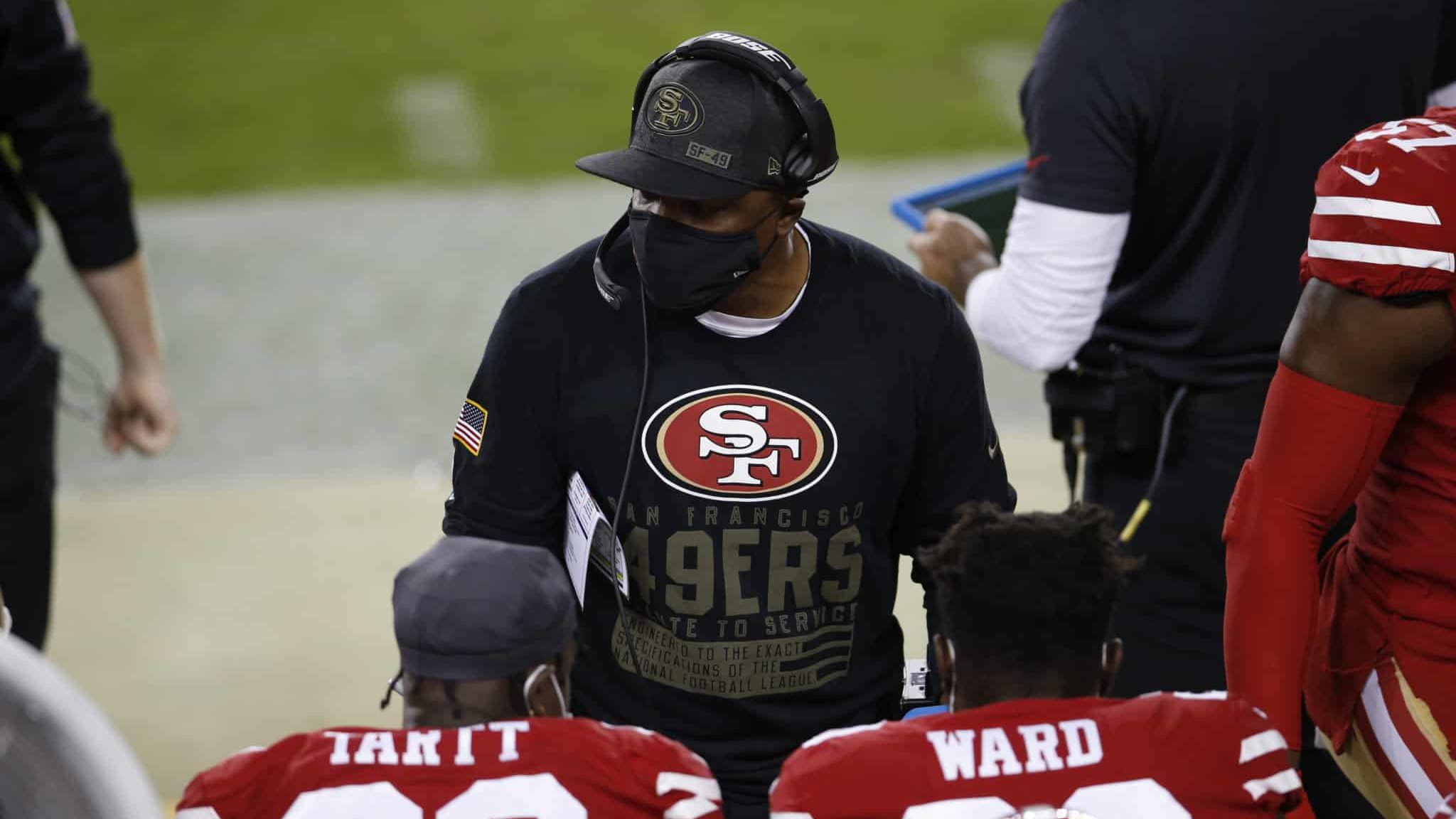 SANTA CLARA, CA - NOVEMBER 3: Defensive backs/cornerbacks coach Tony Oden of the San Francisco 49ers talks with the defensive backs on the sideline during the game against the Green Bay Packers at Levi's Stadium on November 3, 2020 in Santa Clara, California. The Packers defeated the 49ers 34-17.