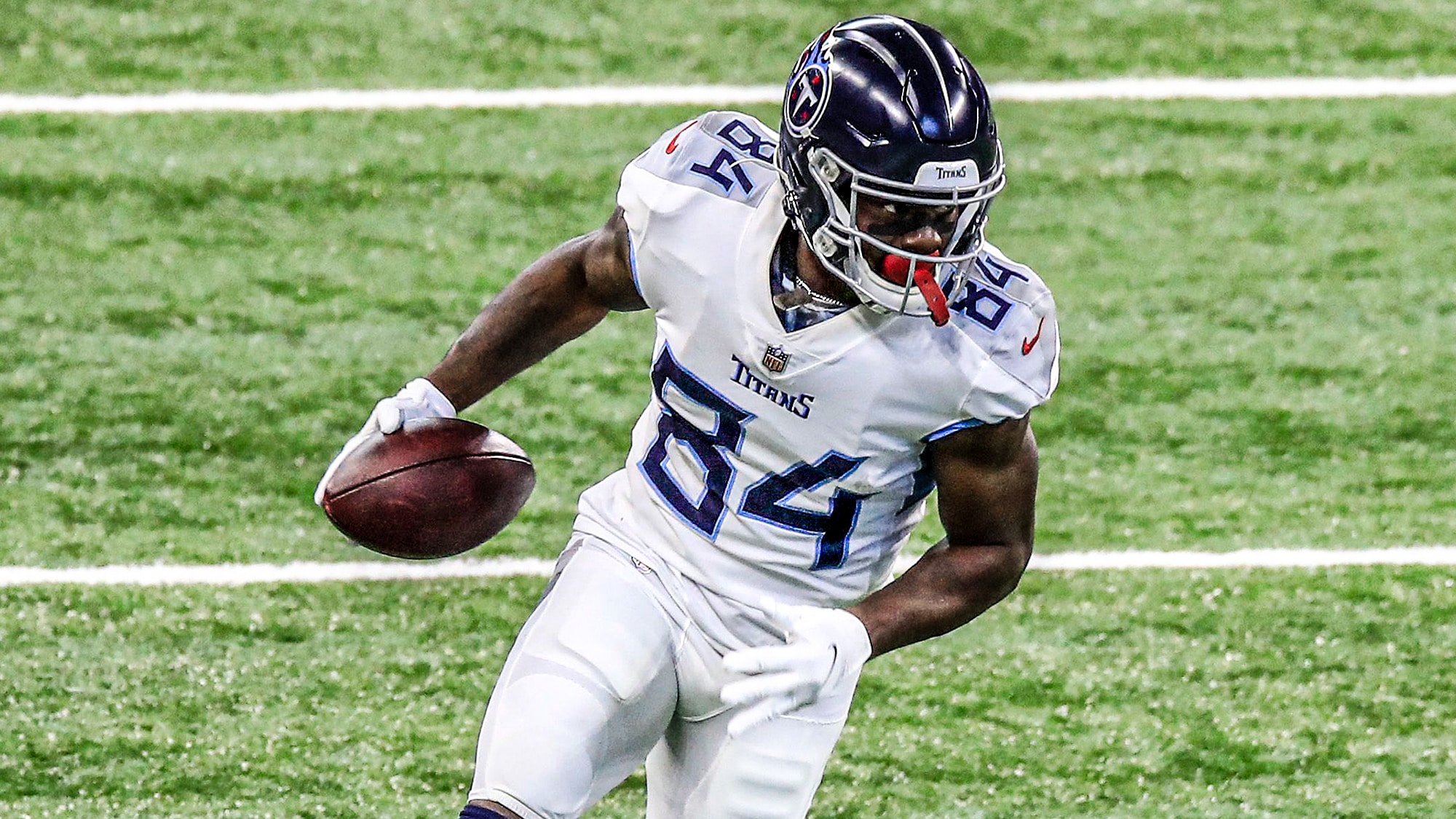 INDIANAPOLIS, INDIANA - NOVEMBER 29: Corey Davis #84 of the Tennessee Titans runs the ball against the Indianapolis Colts at Lucas Oil Stadium on November 29, 2020 in Indianapolis, Indiana.
