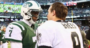 EAST RUTHERFORD, NJ - NOVEMBER 03: Geno Smith #7 of the New York Jets and Drew Brees #9 of the New Orleans Saints meet after he game at MetLife Stadium on November 3, 2013 in East Rutherford, New Jersey.