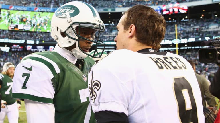 EAST RUTHERFORD, NJ - NOVEMBER 03: Geno Smith #7 of the New York Jets and Drew Brees #9 of the New Orleans Saints meet after he game at MetLife Stadium on November 3, 2013 in East Rutherford, New Jersey.