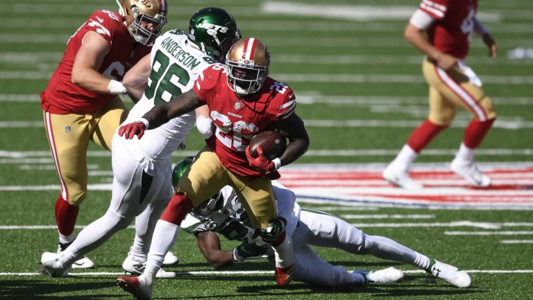EAST RUTHERFORD, NEW JERSEY - SEPTEMBER 20: Tevin Coleman #26 of the San Francisco 49ers carries the ball during the second half against the New York Jets at MetLife Stadium on September 20, 2020 in East Rutherford, New Jersey.