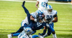NASHVILLE, TENNESSEE - DECEMBER 20: Jonnu Smith #81 of the Tennessee Titans is tackled by the Detroit Lions at Nissan Stadium on December 20, 2020 in Nashville, Tennessee.
