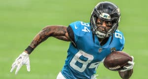 JACKSONVILLE, FLORIDA - OCTOBER 18: Keelan Cole #84 of the Jacksonville Jaguars runs with the ball after a reception against the Detroit Lions during the third quarter in the game at TIAA Bank Field on October 18, 2020 in Jacksonville, Florida.