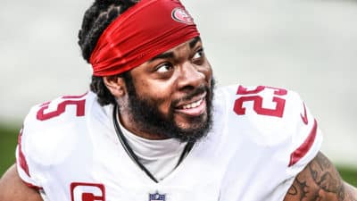 INGLEWOOD, CALIFORNIA - NOVEMBER 29: Richard Sherman #25 of the San Francisco 49ers speaks to a teammate on the bench in the second quarter against the Los Angeles Rams at SoFi Stadium on November 29, 2020 in Inglewood, California.