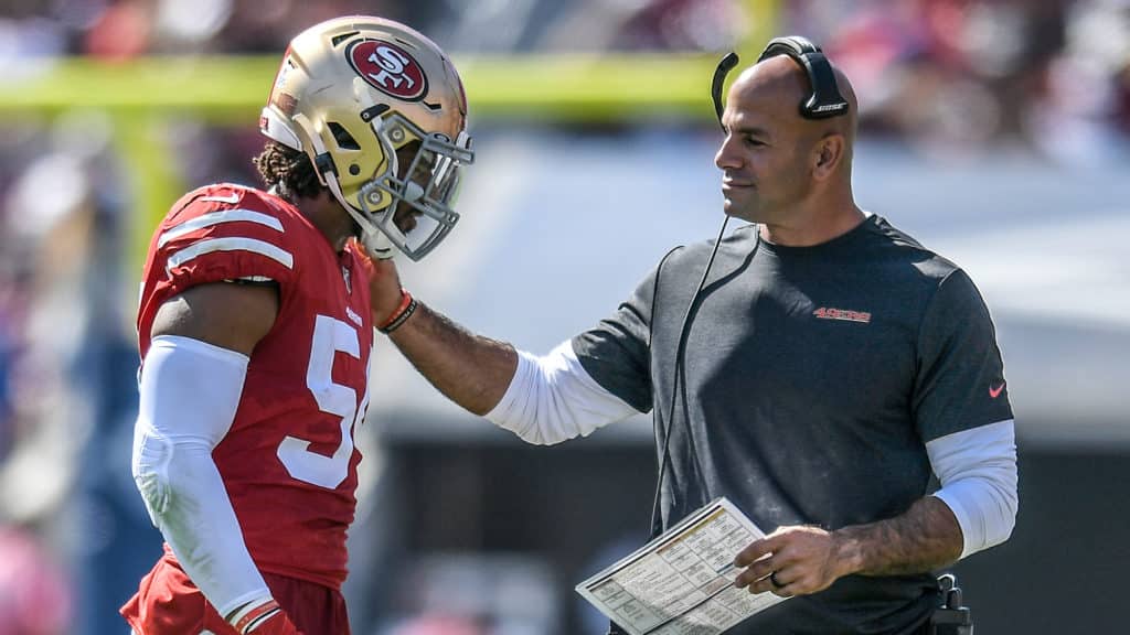 LOS ANGELES, CA - OCTOBER 13: Fred Warner #54 of the San Francisco 49ers talks with defensive coordinator Robert Saleh while playing the Los Angeles Rams at Los Angeles Memorial Coliseum on October 13, 2019 in Los Angeles, California.