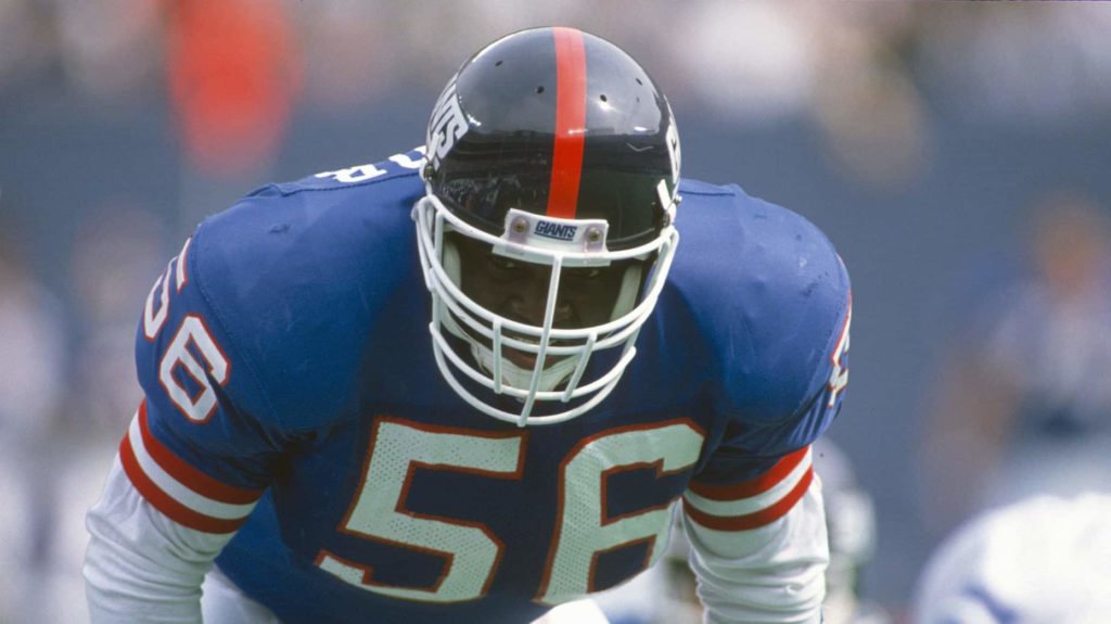 EAST RUTHERFORD, NJ - SEPTEMBER 30: Lawrence Taylor #56 of the New York Giants in action against the Dallas Cowboys during an NFL football game September 30, 1990 at The Meadowlands in East Rutherford, New Jersey. Taylor played for the Giants from 1981-93.