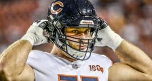 LANDOVER, MD - SEPTEMBER 23: Bears G Kyle Long (75) straps up his helmet and he waits for the game to start during the Chicago Bears vs. Washington Redskins Monday Night Football game September 23, 2019 at FedEx Field in Landover, MD.