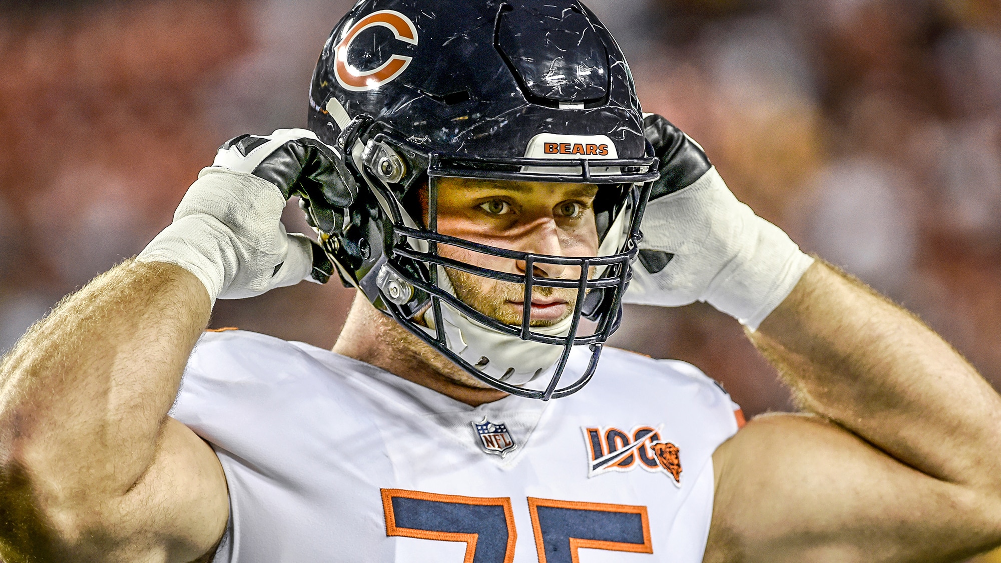 LANDOVER, MD - SEPTEMBER 23: Bears G Kyle Long (75) straps up his helmet and he waits for the game to start during the Chicago Bears vs. Washington Redskins Monday Night Football game September 23, 2019 at FedEx Field in Landover, MD.