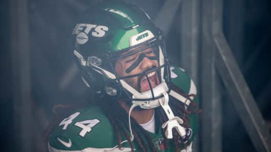 New York Jets defensive lineman Nathan Shepherd (97) wearing a face mask  head off the field after an NFL football game against the Los Angeles  Chargers, Sunday, November 22, 2020 in Inglewood