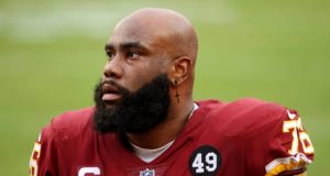 LANDOVER, MARYLAND - DECEMBER 20: Offensive tackle Morgan Moses #76 of the Washington Football Team looks on from the sideline in the second half against the Seattle Seahawks at FedExField on December 20, 2020 in Landover, Maryland.