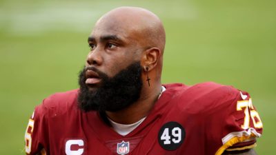 LANDOVER, MARYLAND - DECEMBER 20: Offensive tackle Morgan Moses #76 of the Washington Football Team looks on from the sideline in the second half against the Seattle Seahawks at FedExField on December 20, 2020 in Landover, Maryland.