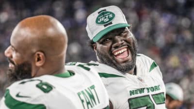 NY Jets OT Mekhi Becton says Carl Lawson makes the real game easier for him.