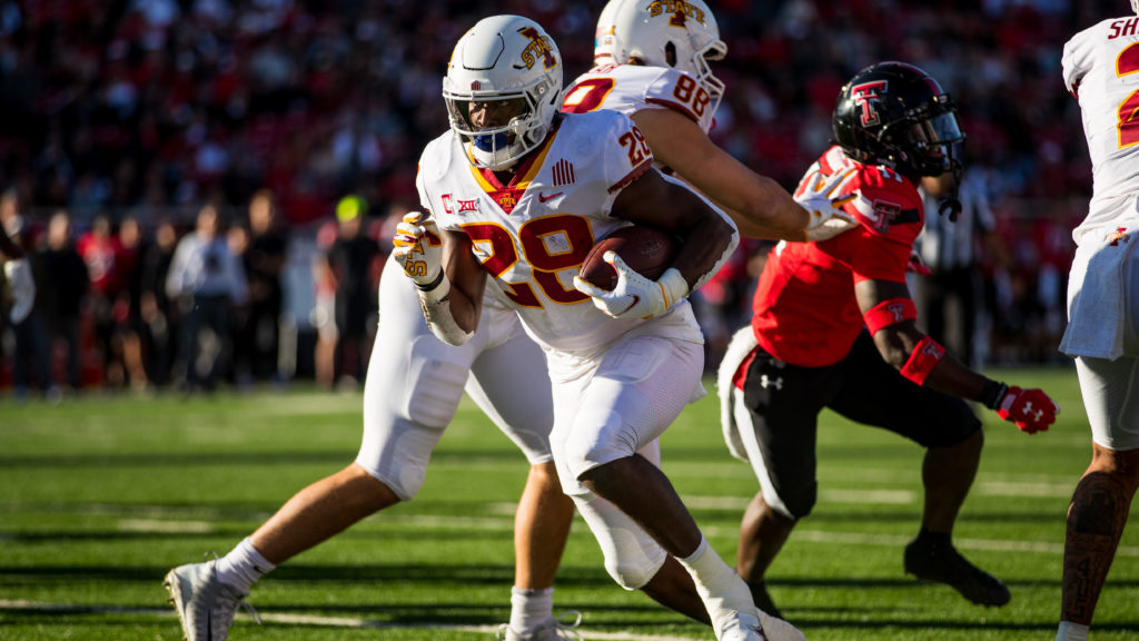 LUBBOCK, TEXAS - NOVEMBER 13: Running back Breece Hall #28 of the Iowa State Cyclones runs the ball during the first half of the college football game against the Texas Tech Red Raiders at Jones AT&T Stadium on November 13, 2021 in Lubbock, Texas.