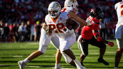 LUBBOCK, TEXAS - NOVEMBER 13: Running back Breece Hall #28 of the Iowa State Cyclones runs the ball during the first half of the college football game against the Texas Tech Red Raiders at Jones AT&T Stadium on November 13, 2021 in Lubbock, Texas.