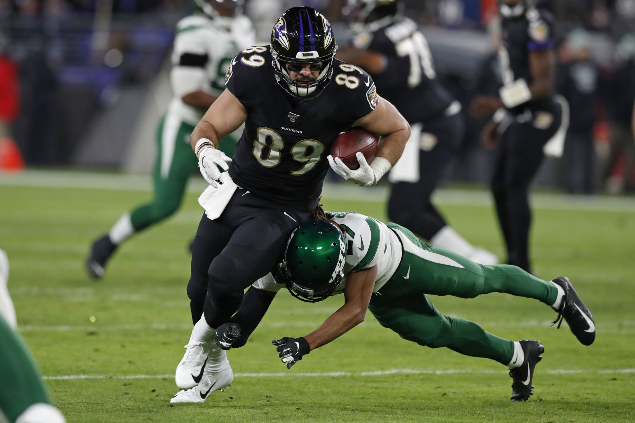 BALTIMORE, MARYLAND - DECEMBER 12: Tight end Mark Andrews #89 of the Baltimore Ravens runs with the ball during the first quarter against the New York Jets at M&T Bank Stadium on December 12, 2019 in Baltimore, Maryland.