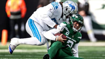 Zach Wilson, NY Jets, Lions OL, Stats, Sack