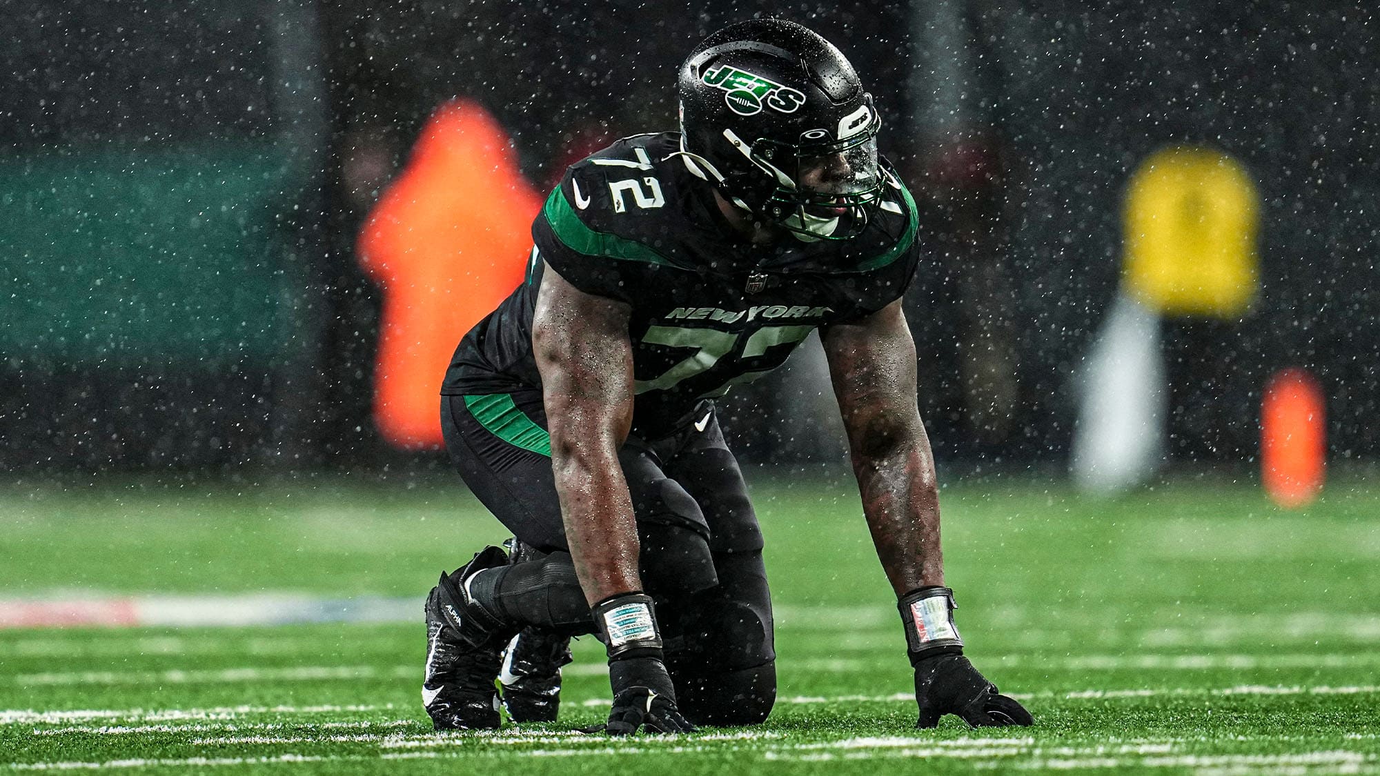 New York Jets defensive end Micheal Clemons (72) runs against the