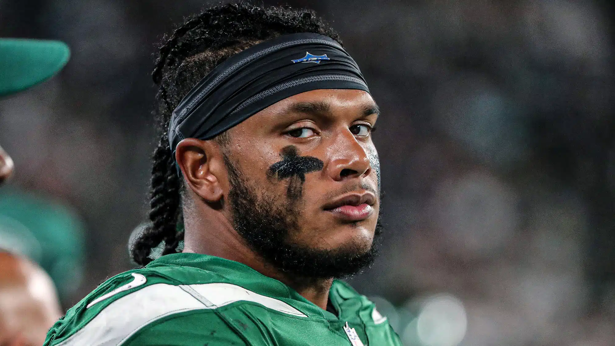 New York Jets linebacker Jermaine Johnson (52) warms up before playing  against the Buffalo Bills in